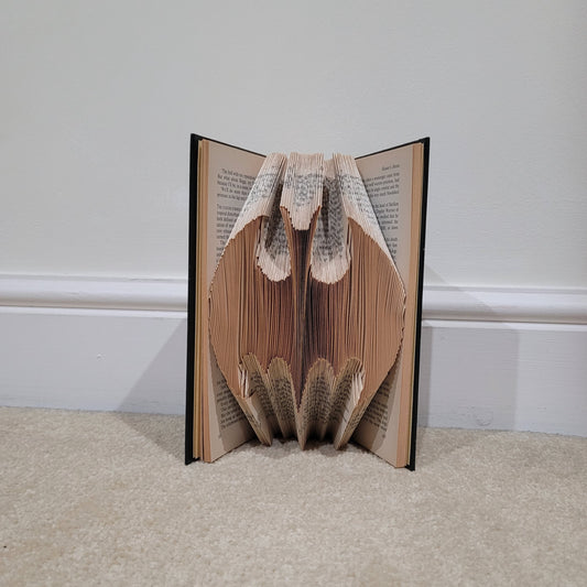 A Book fold with the Batman Logo folded in