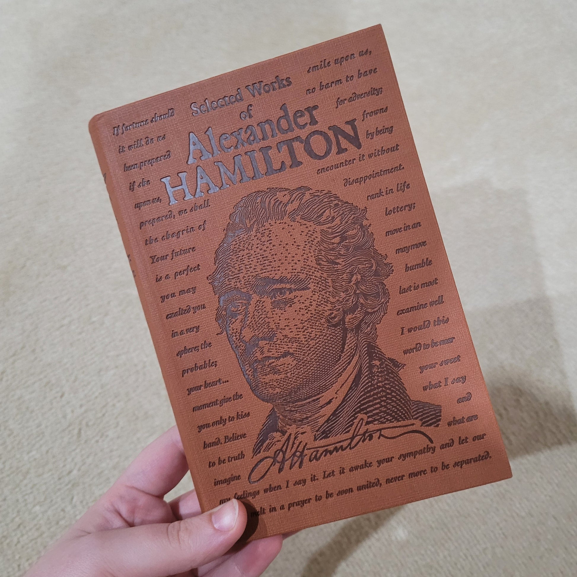 The front of the book fold "the selected works of Alexander Hamilton"