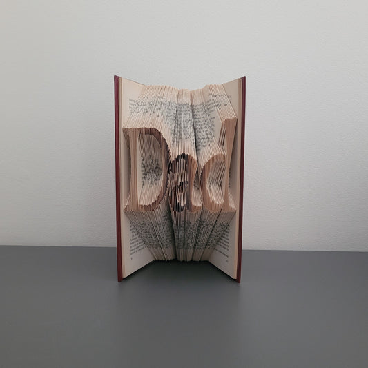 A book fold with the word "Dad" on the front