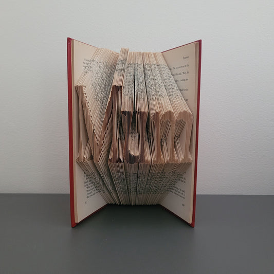 A book fold with the word "Mum" on the front.
