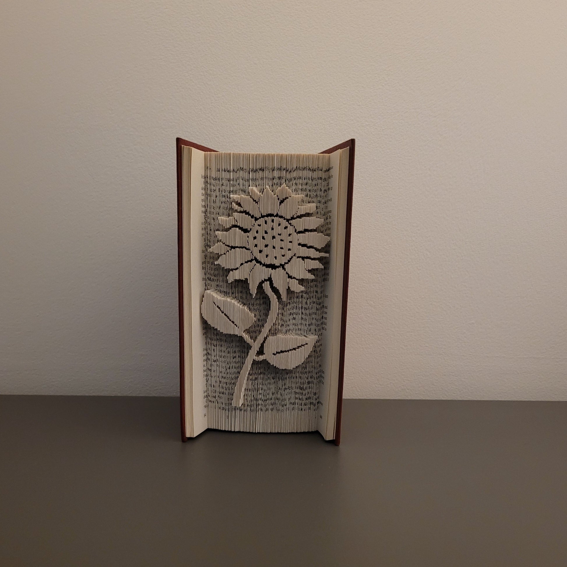 A picture of a sunflower book fold.