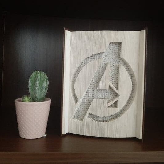 Book Fold Art showing the Avengers Logo "A" on the front