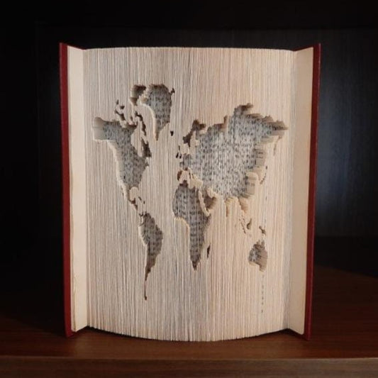 A book fold with a picture of the world on